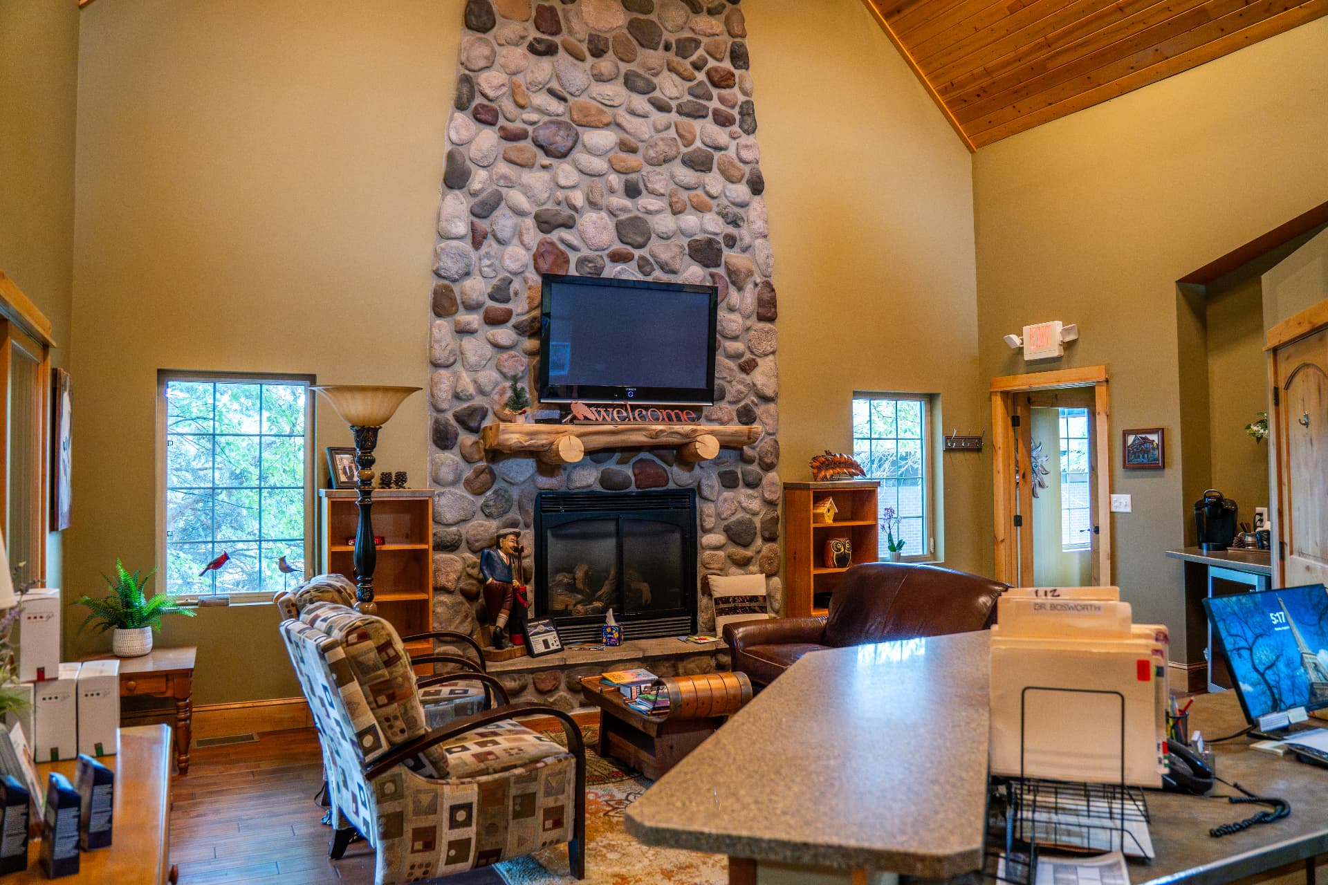 7. Inside: the vaulted lobby and stone fireplace.
